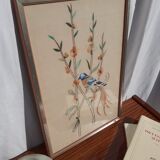 Tableau brodé oiseau bleu et orange