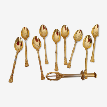 12 small golden spoons