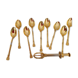 12 small golden spoons