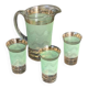 Serve an orangeade, a carafe and 3 glasses in green granite with golden trim.