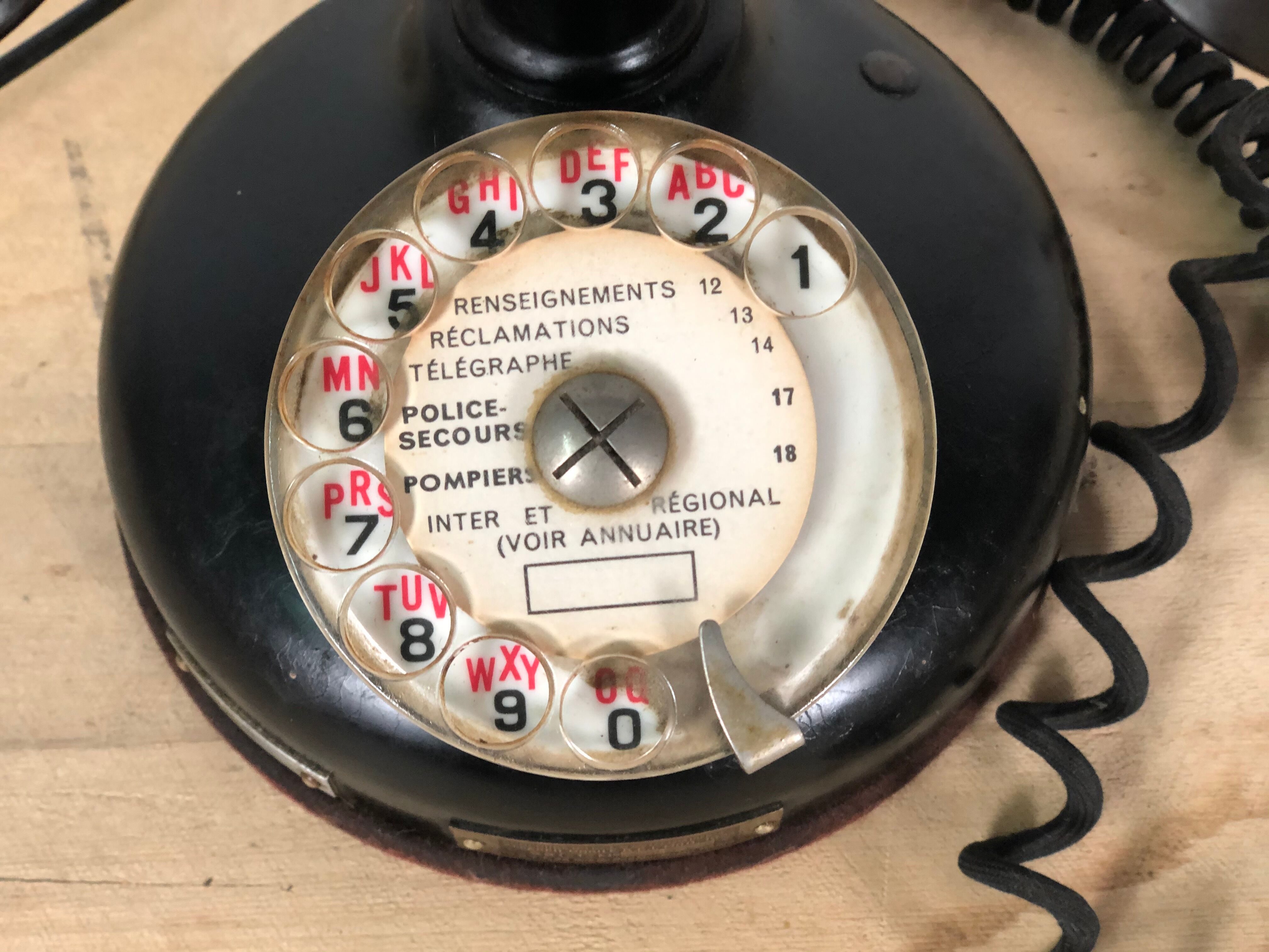 Old column phone in Bakelite and metal 1936