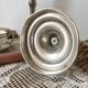Pair of silver-plated metal candlesticks