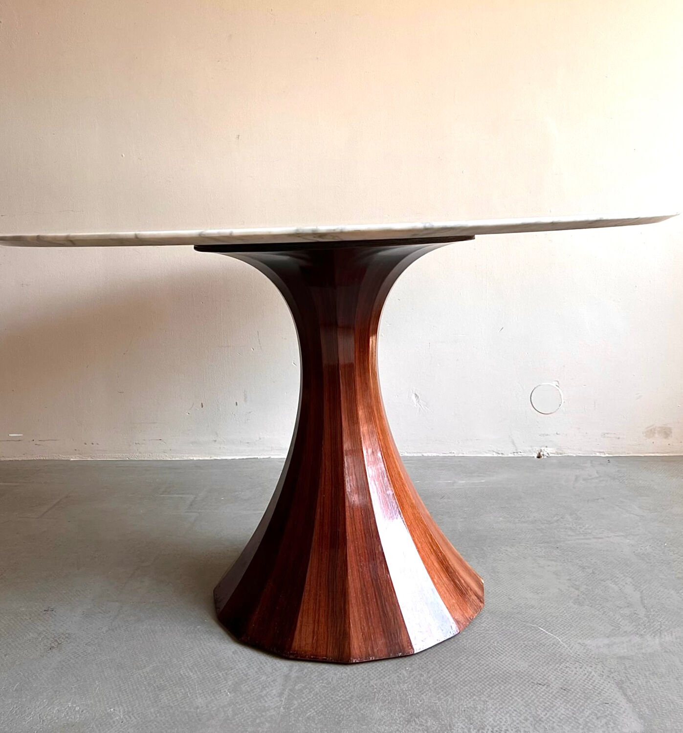 Marble dining table with rosewood base