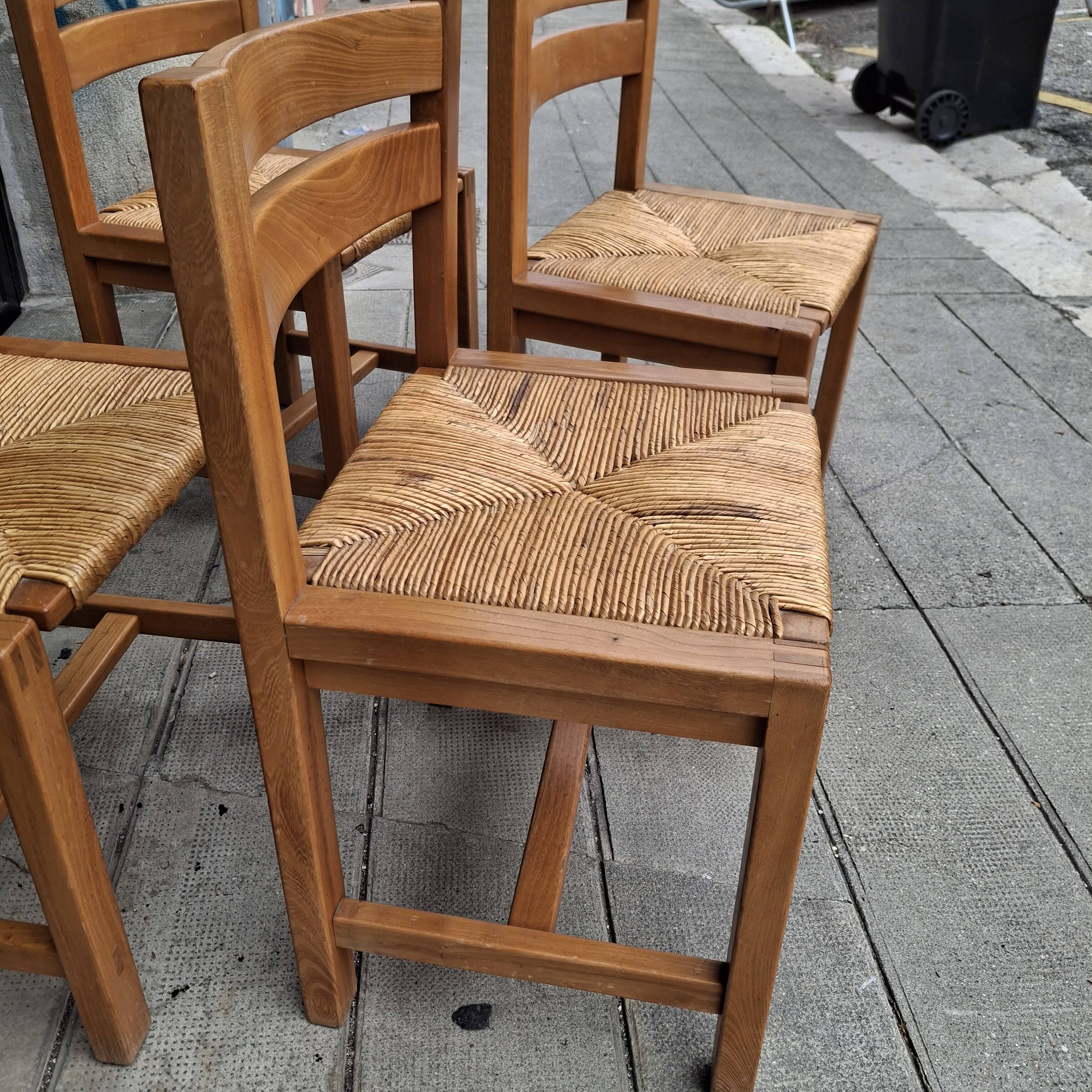 Set of four regaining chairs in elm. 1970