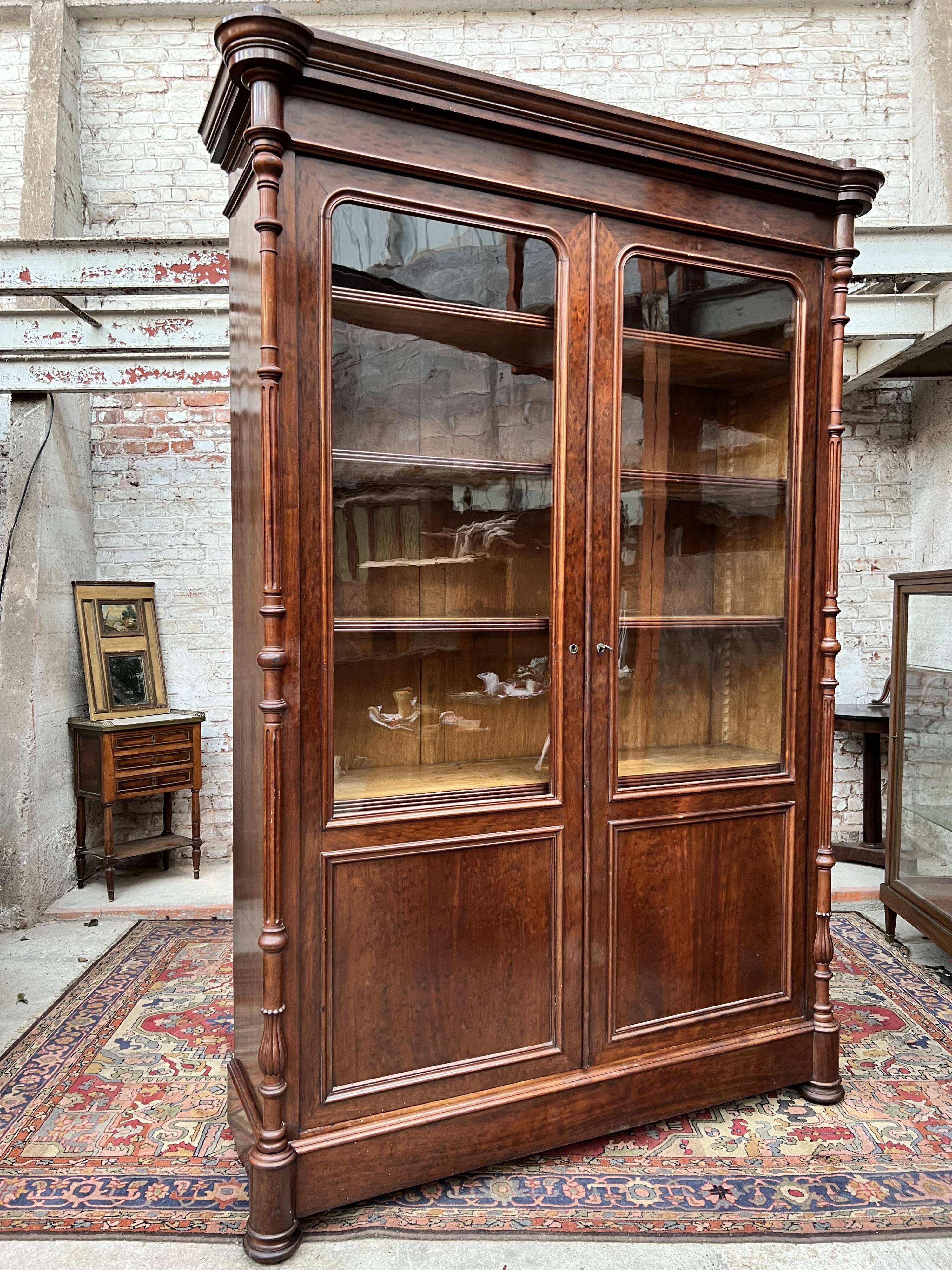 Speckled mahogany bookcase of Napoleon III XIX century