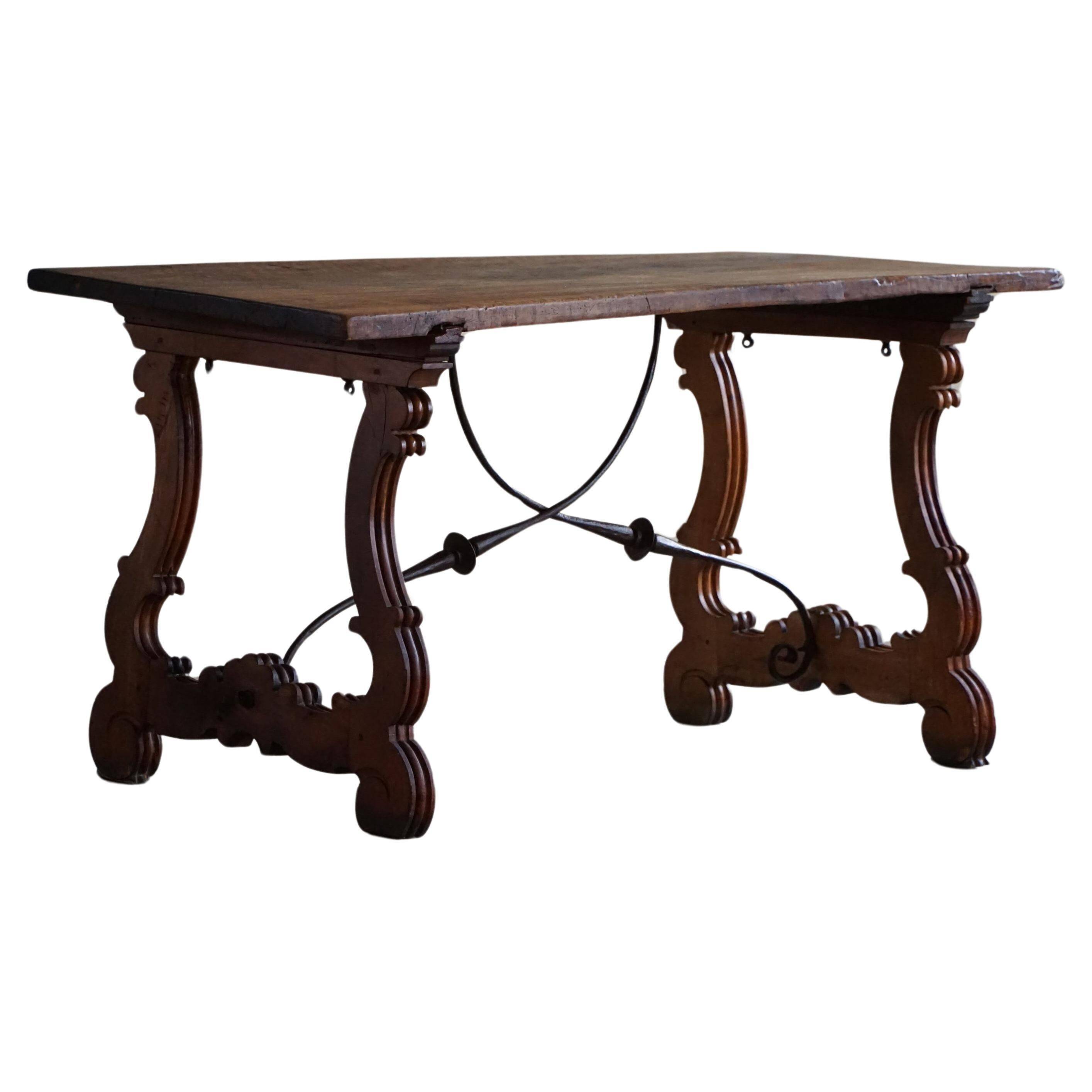 Brutalist table in antique Spanish solid oak and wrought iron, 19th century.