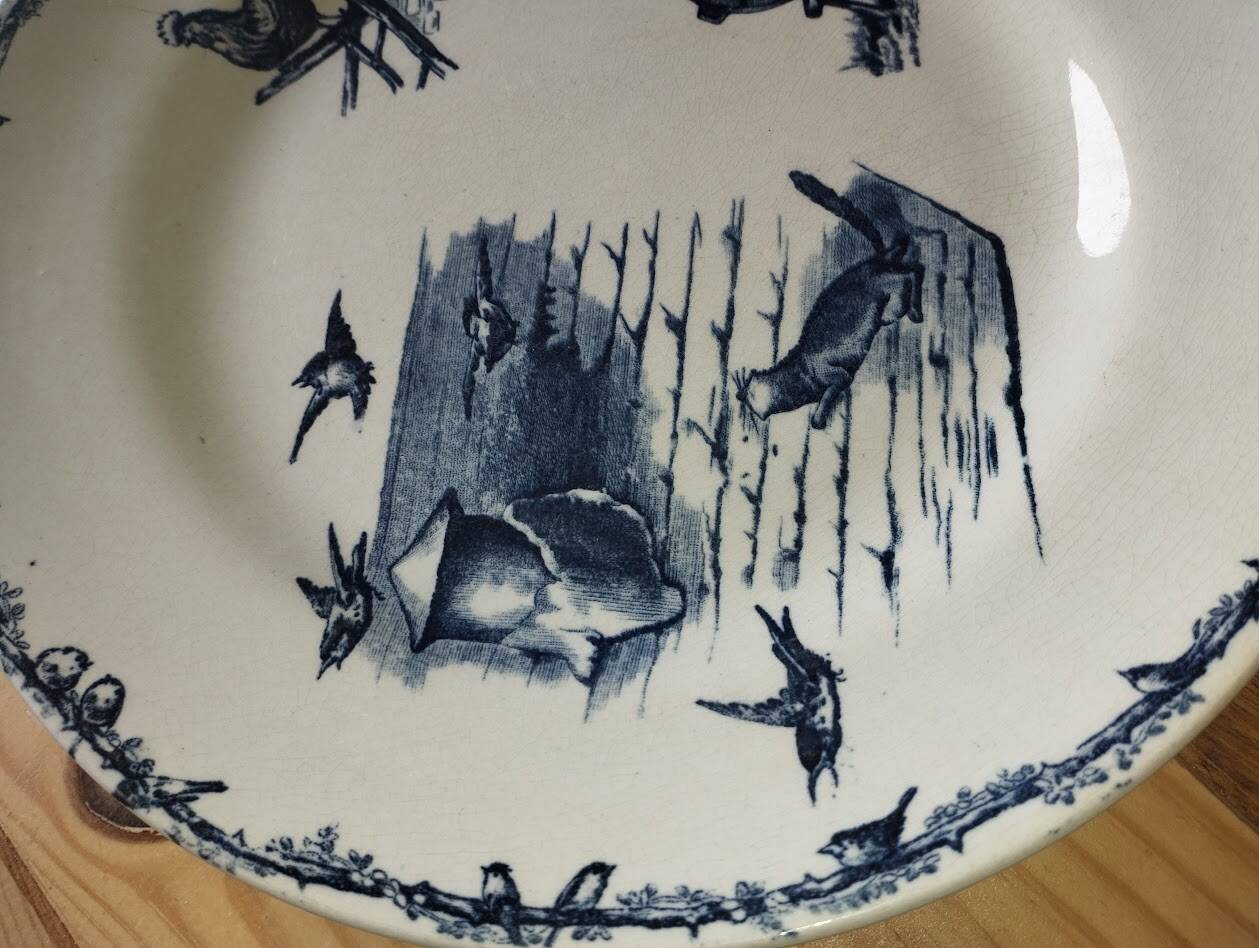 Assiettes Terre de Fer – Décor pastoral bleu – XIXe