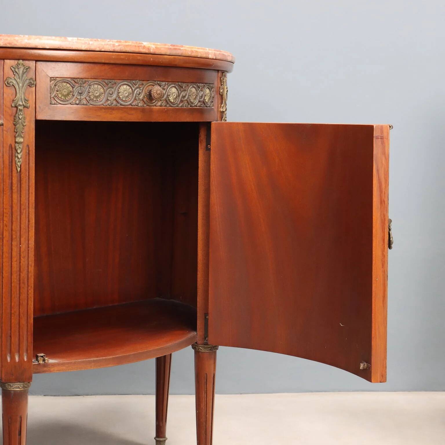 Antique demi-lune buffets in neoclassical style in mahogany from the 20th century.