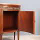 Antique demi-lune buffets in neoclassical style in mahogany from the 20th century.