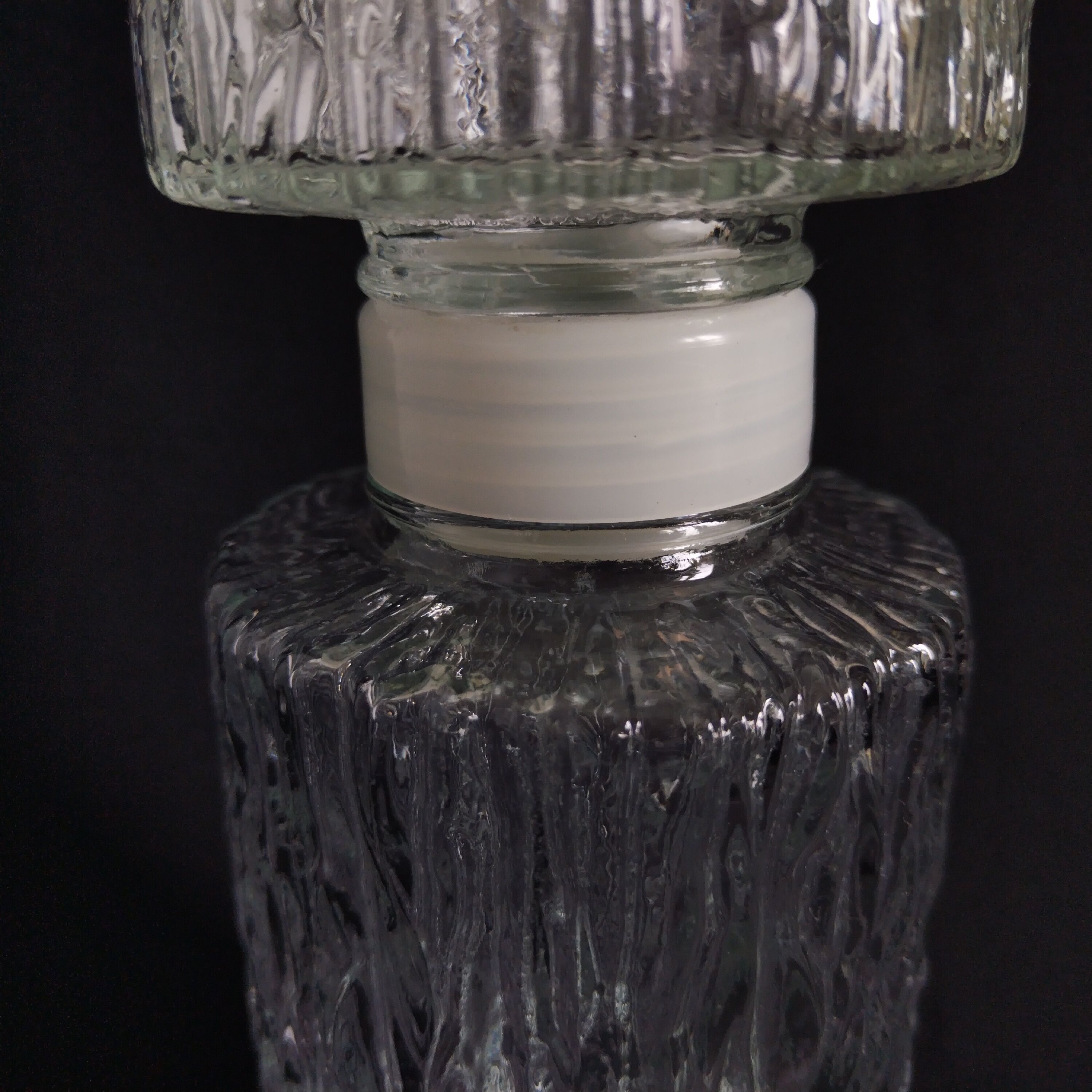 Transparent vintage carafe in pressed glass and its hermetic cap 70's