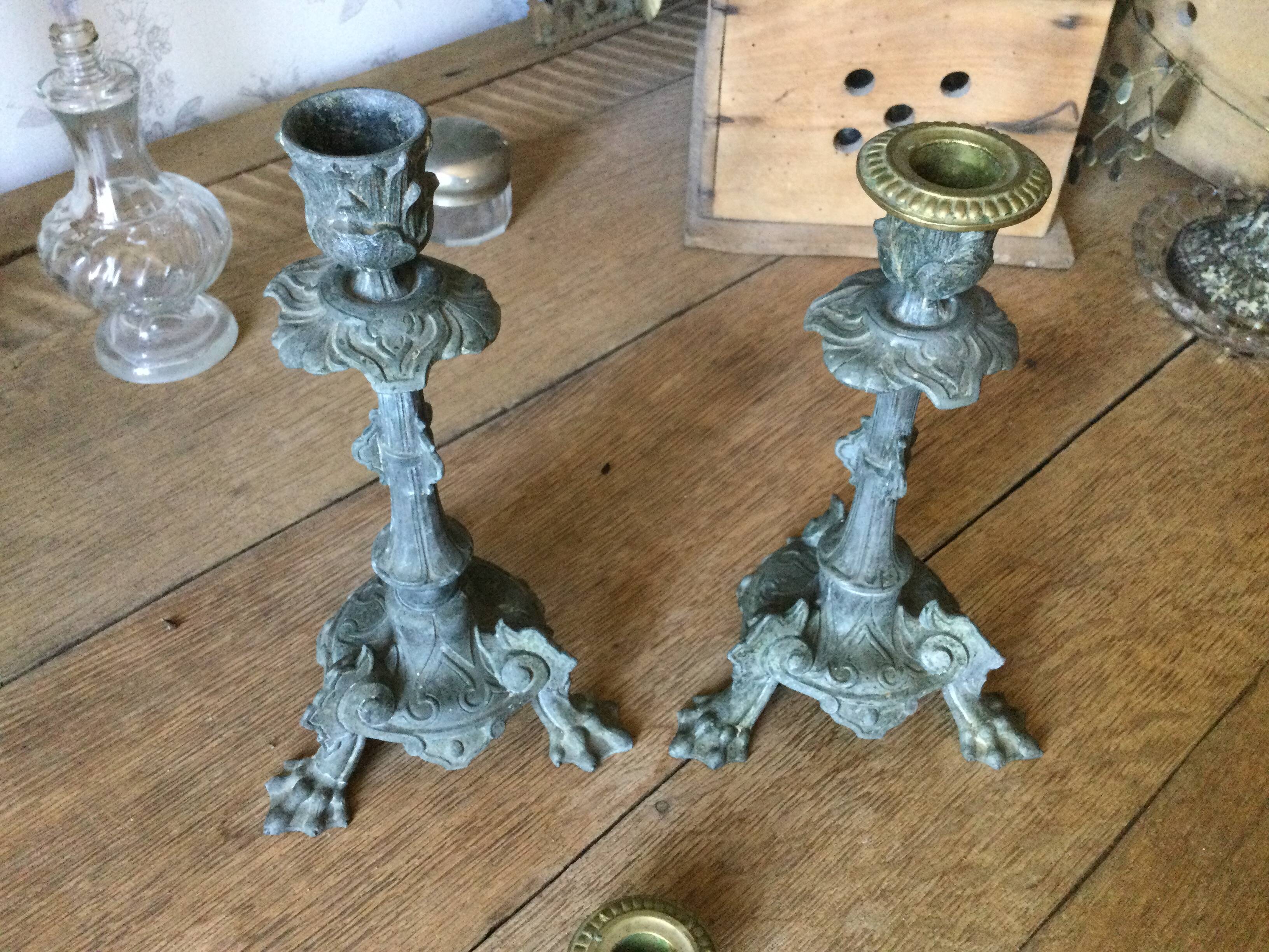 Set of 2 antique candlesticks in spelter.