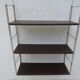 Metal string modular wall shelf