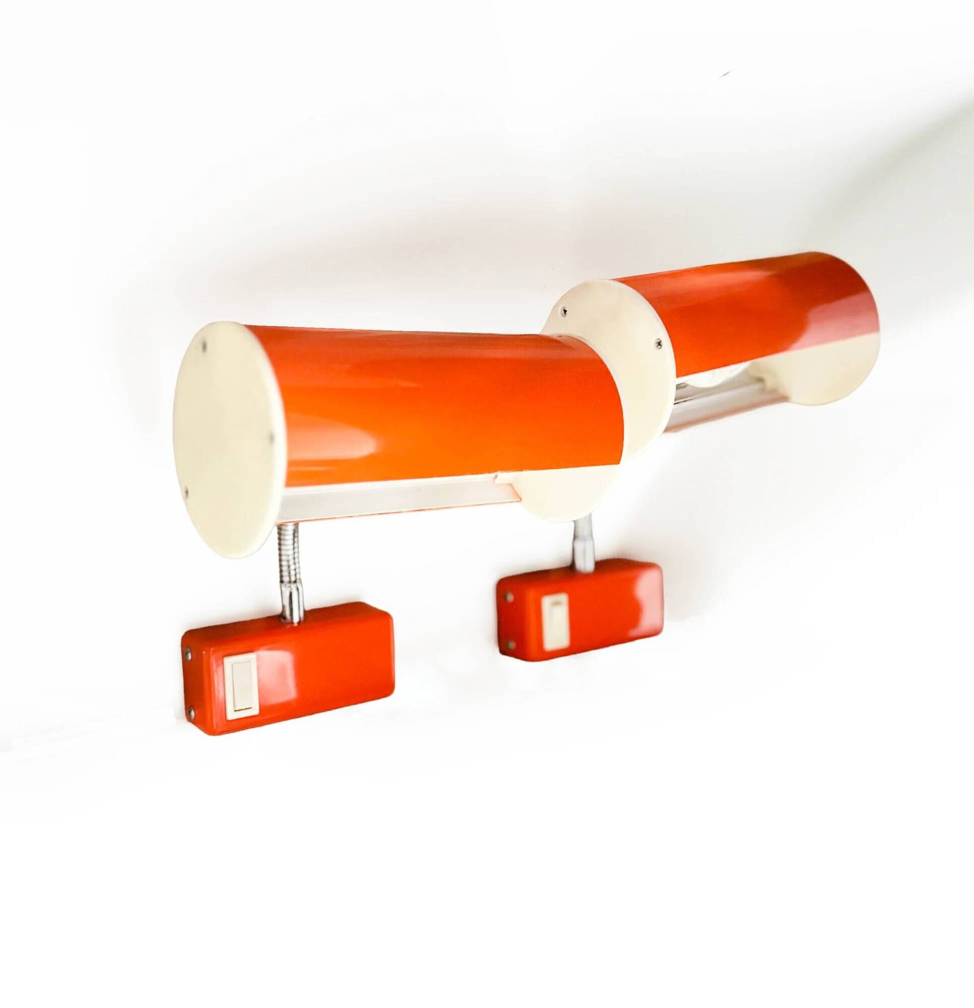 Pair of orange wall sconces from the 1970s by Ateljé Lyktan.