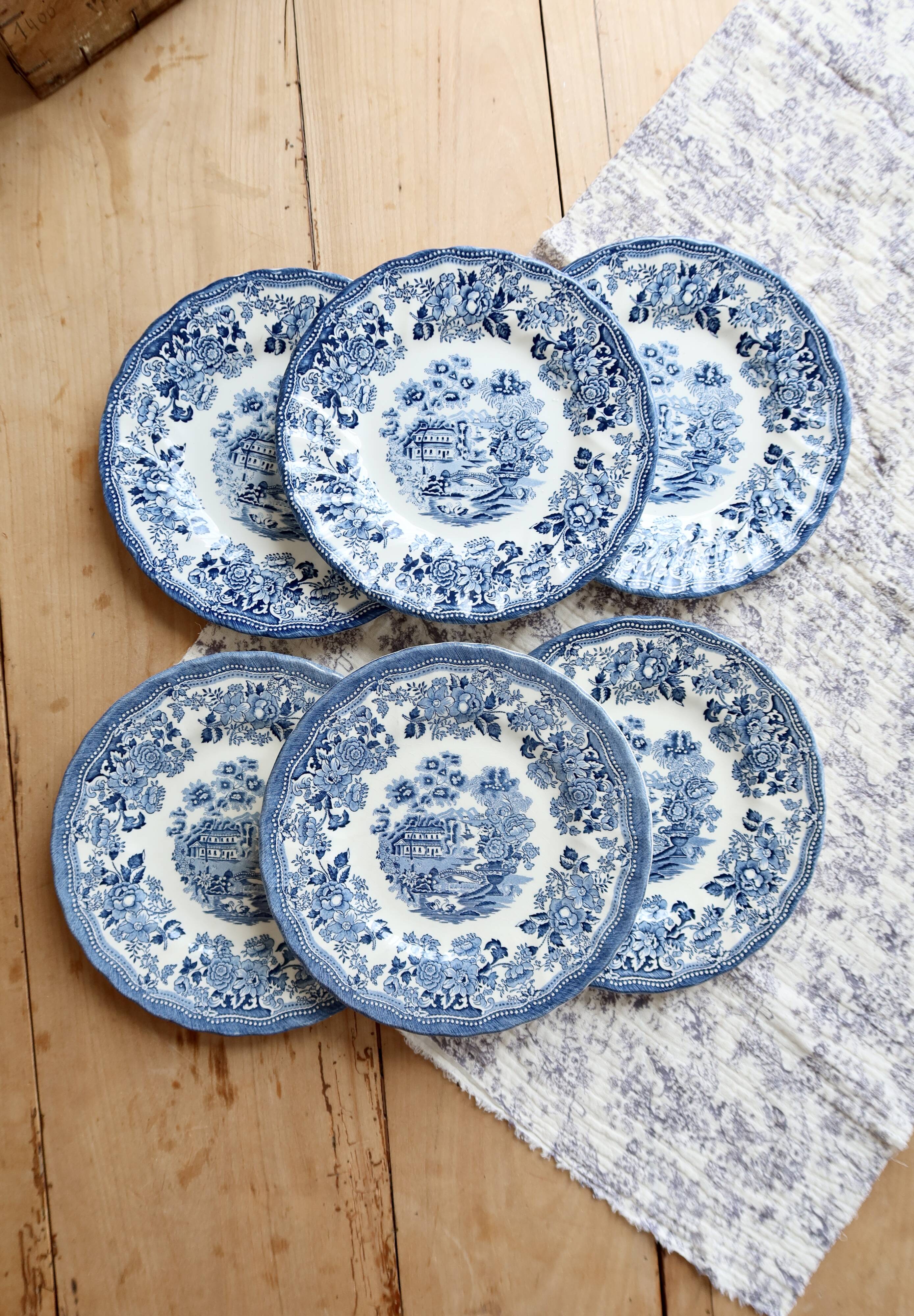 6 English dessert plates by Churchill with a romantic blue design.