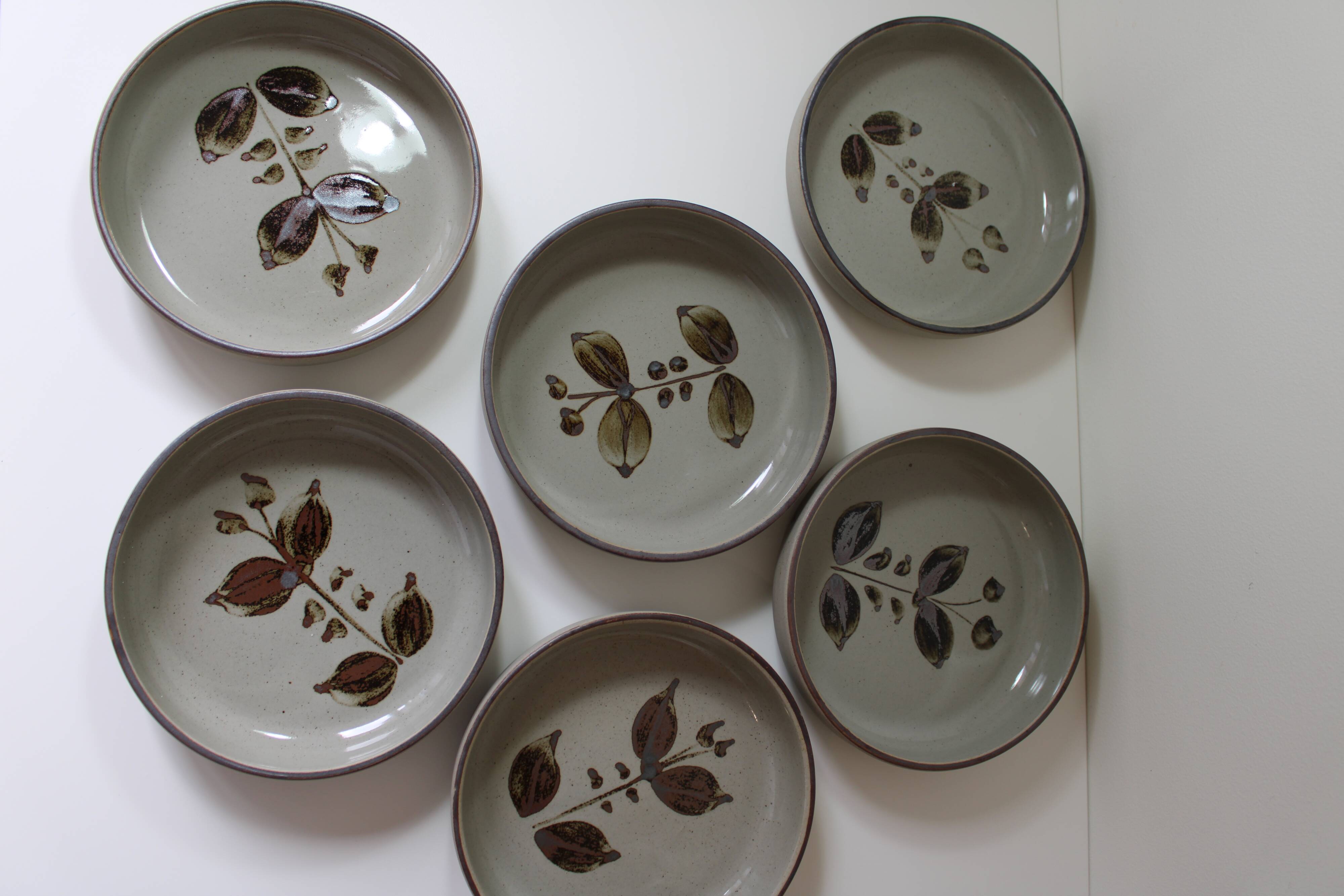 6 small vintage Arnon stoneware flower deep plates