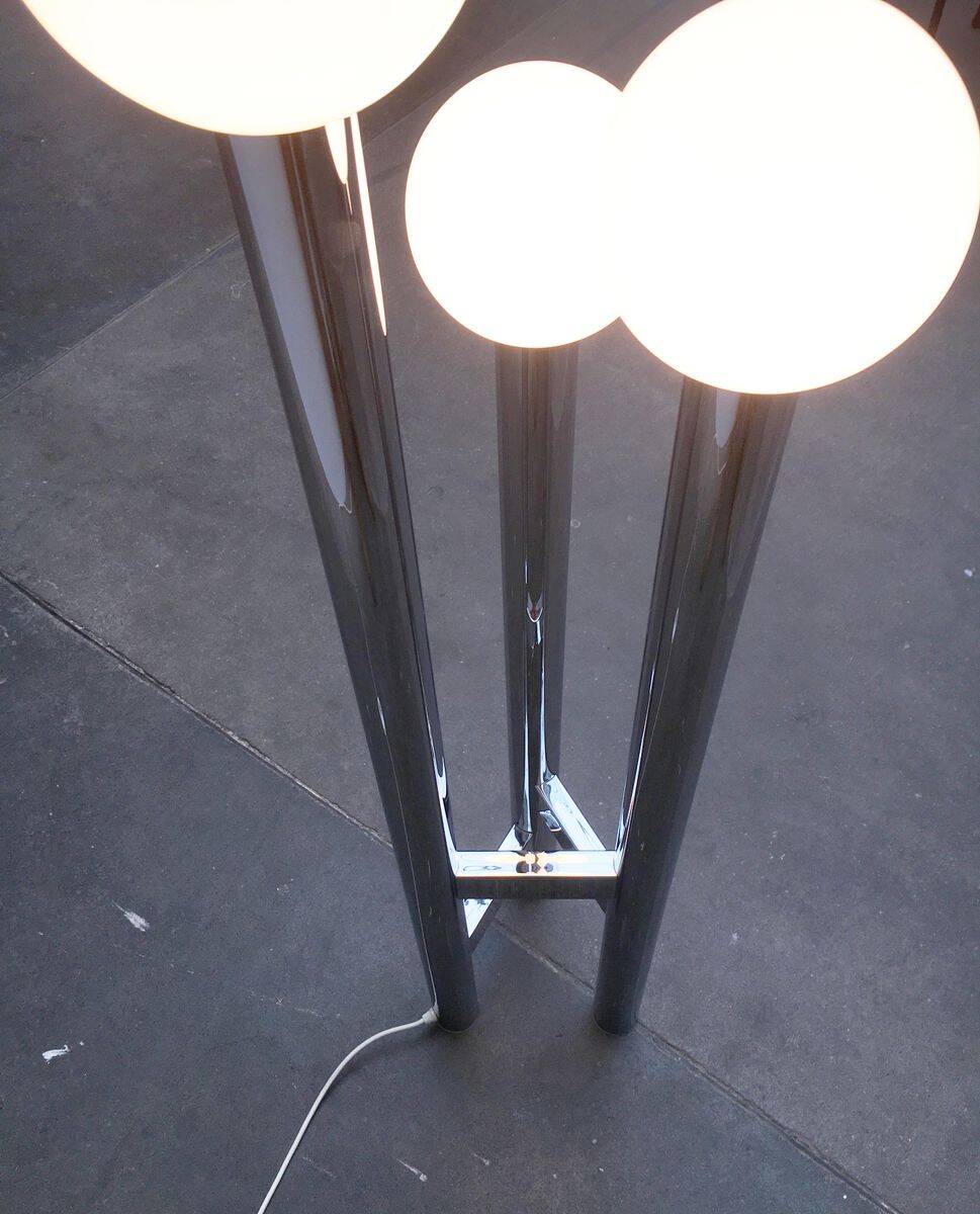 Vintage German floor lamp from the space age of the 1970s in glass and metal.
