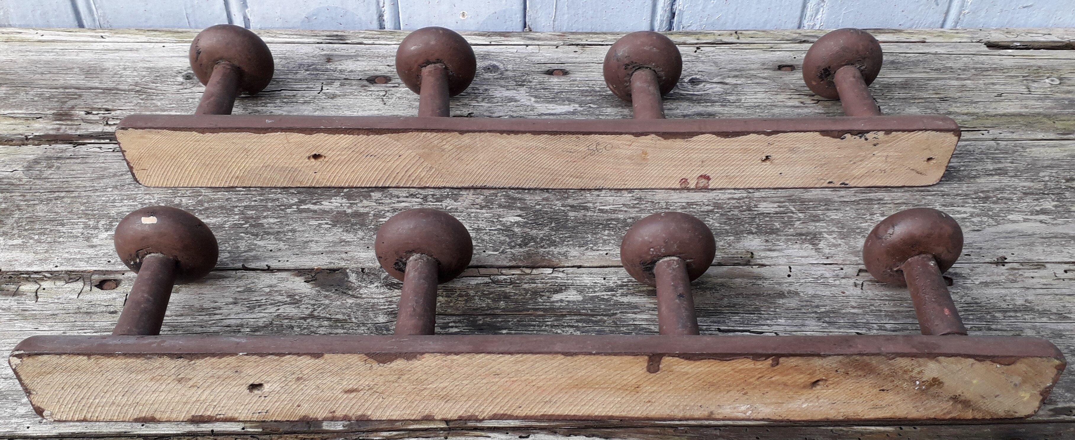 Pair of brown wooden coats