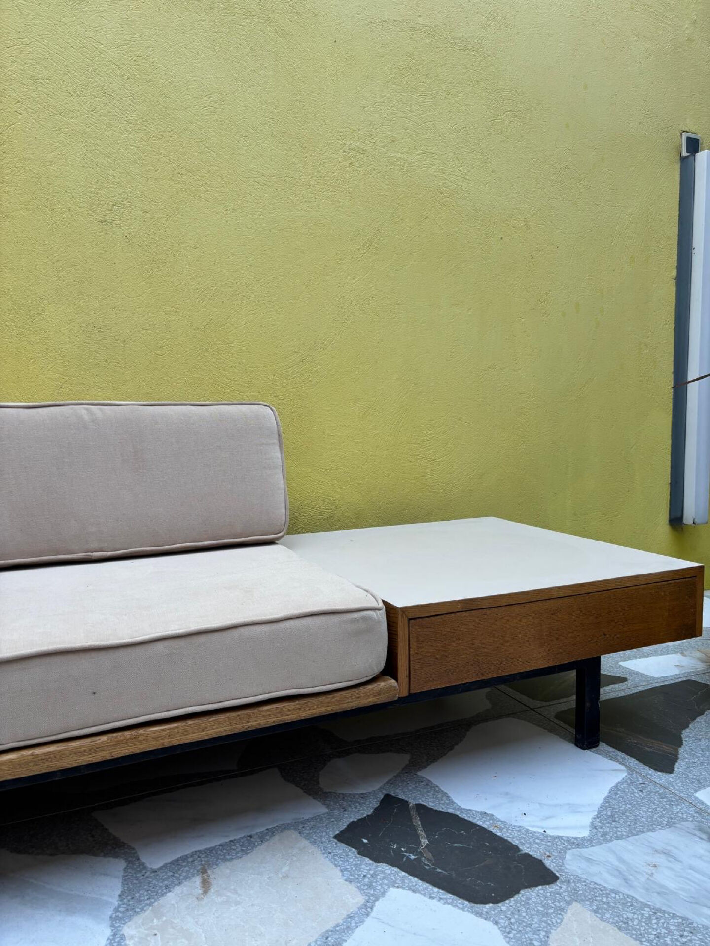 Banquette with storage by Charlotte Perriand