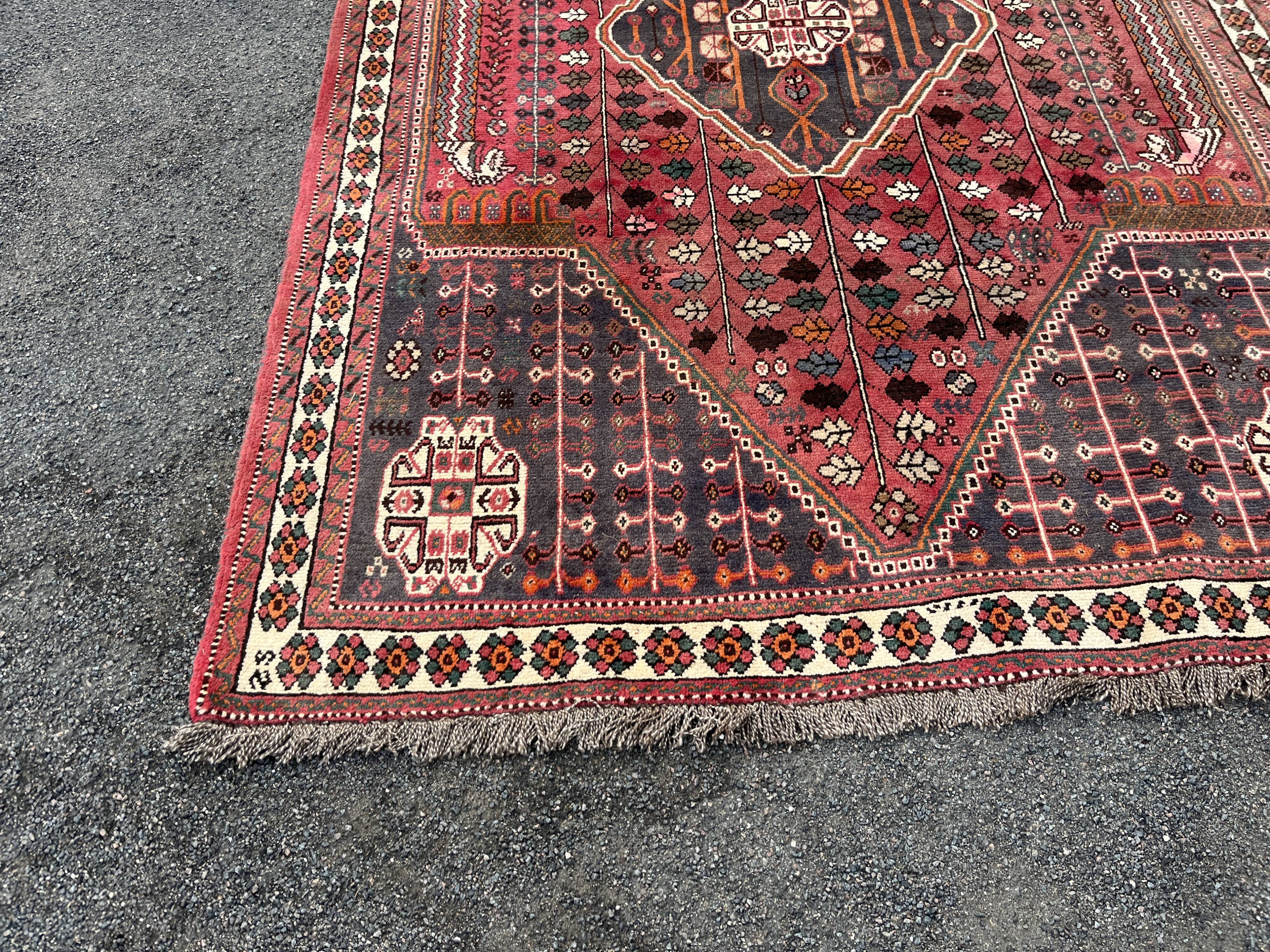 Large red Persian wool rug with red geometric design 2.97 x 2.05 m