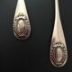 4 antique silver-plated metal teaspoons
