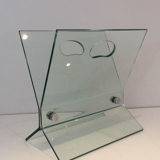 Design magazine holders in glass and brushed steel