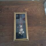 Frame of plants and edelweiss signed.