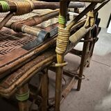 Old long chair rattan wicker garden armchair