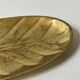Brass leaf-shaped catchall, signed Christofle.