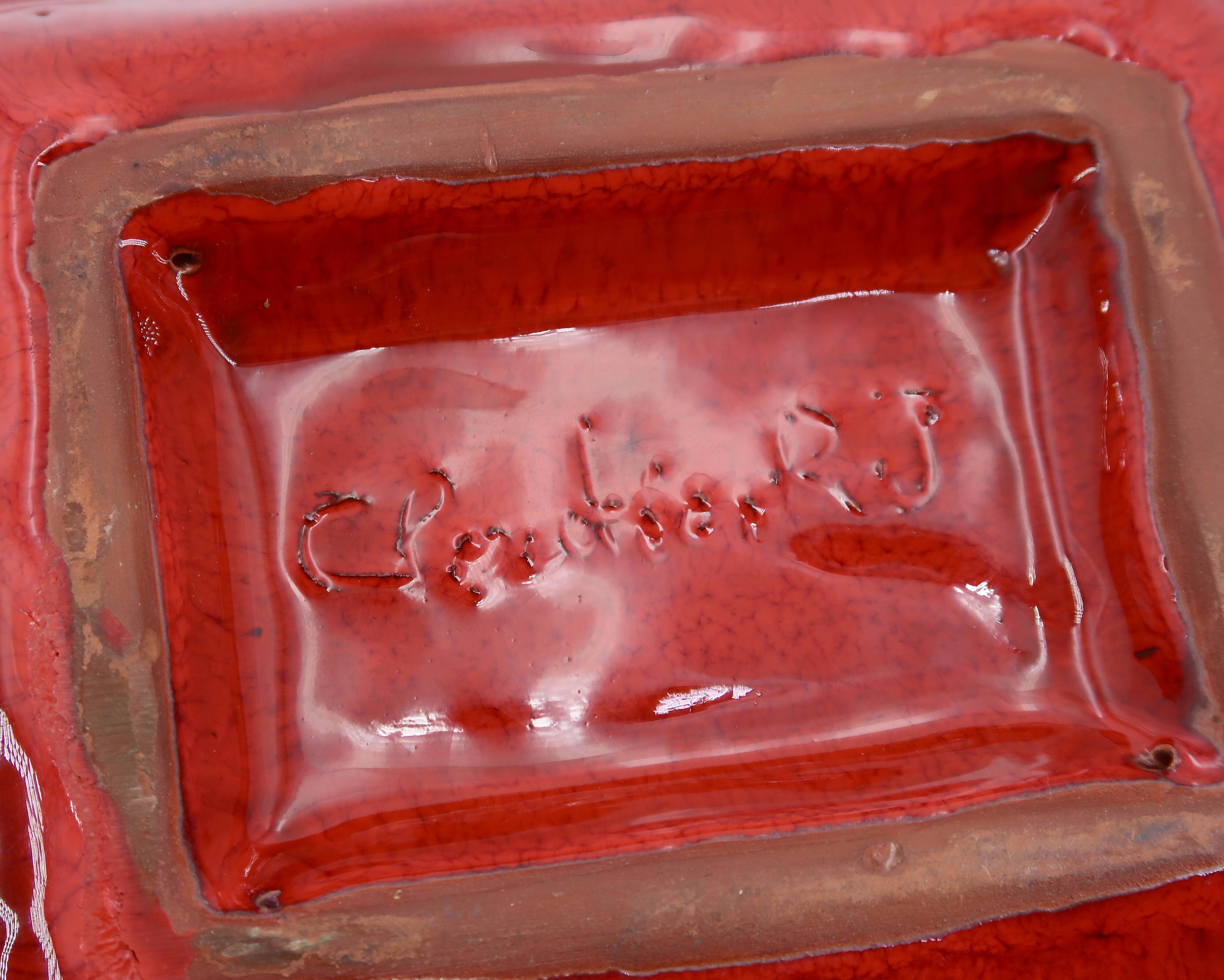 Rectangular ceramic catchall in red by Jean and Robert Cloutier.