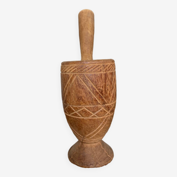 Carved wooden mortar and pestle, Africa.