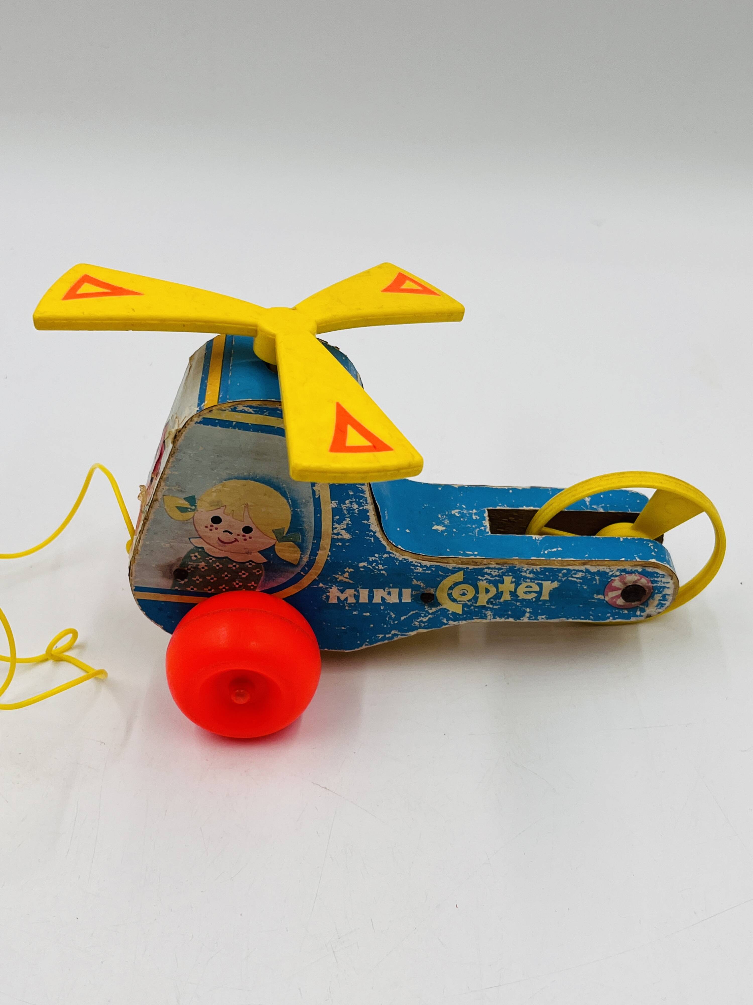 Set of 4 Fisher-Price wooden toys from the 1960s