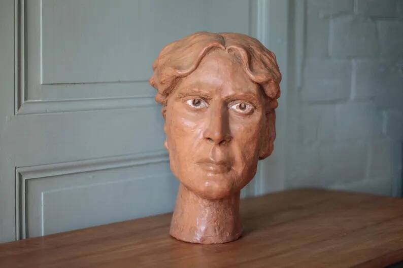 Sculpture signed Doloire, terracotta sculpture, sculpture of a man's head, collection, interior decoration.