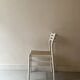 Paire de chaises vintage en bois blanc et paille