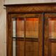 Vintage walnut burr buffet with glass and lighting, Art Deco style.