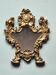 Petit miroir suspendu en métal doré