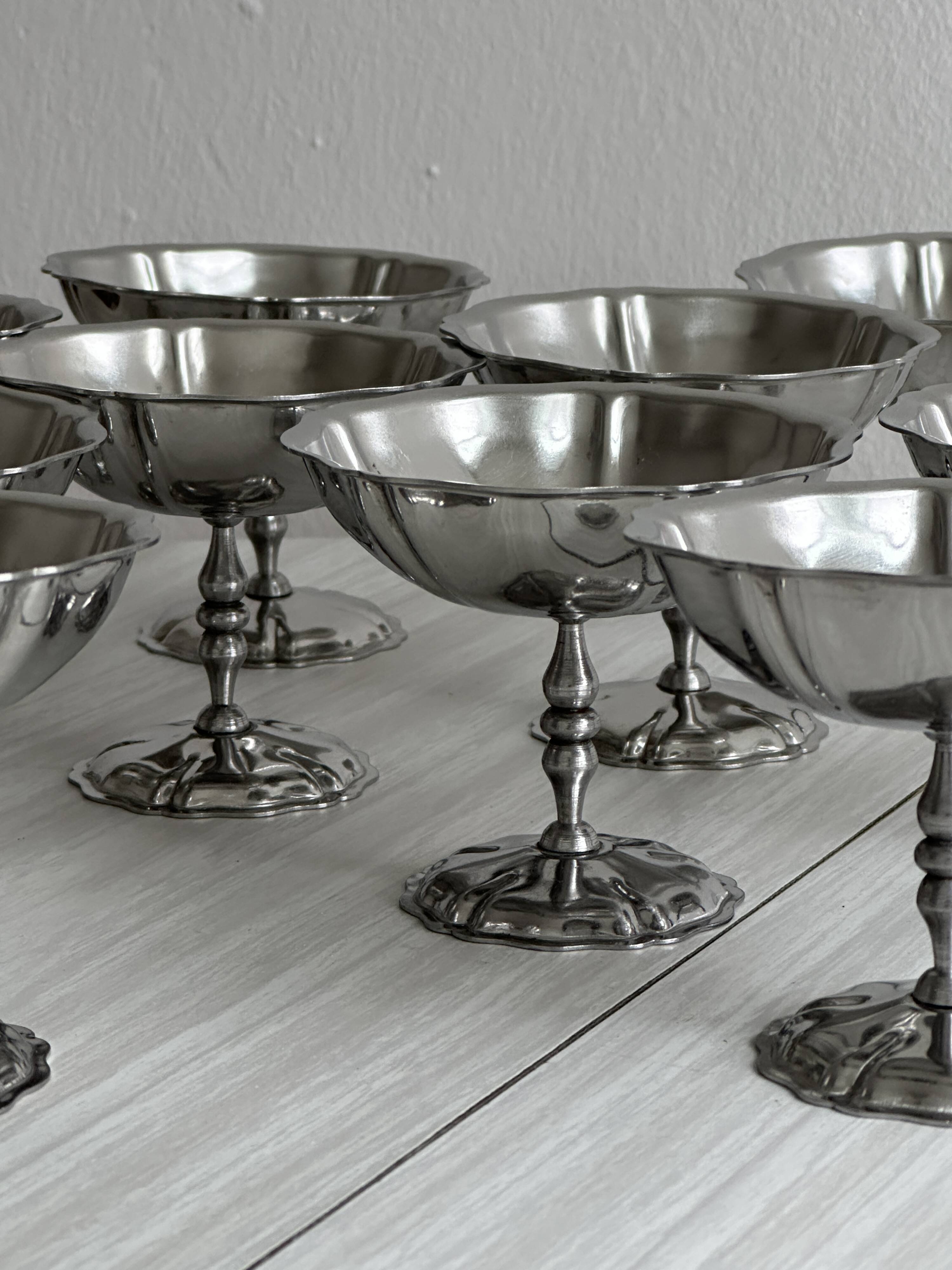 10 footed bowls in stainless steel in the style of Letang Remy
