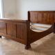 Double bed 160 cm in solid walnut with electric mattress base.