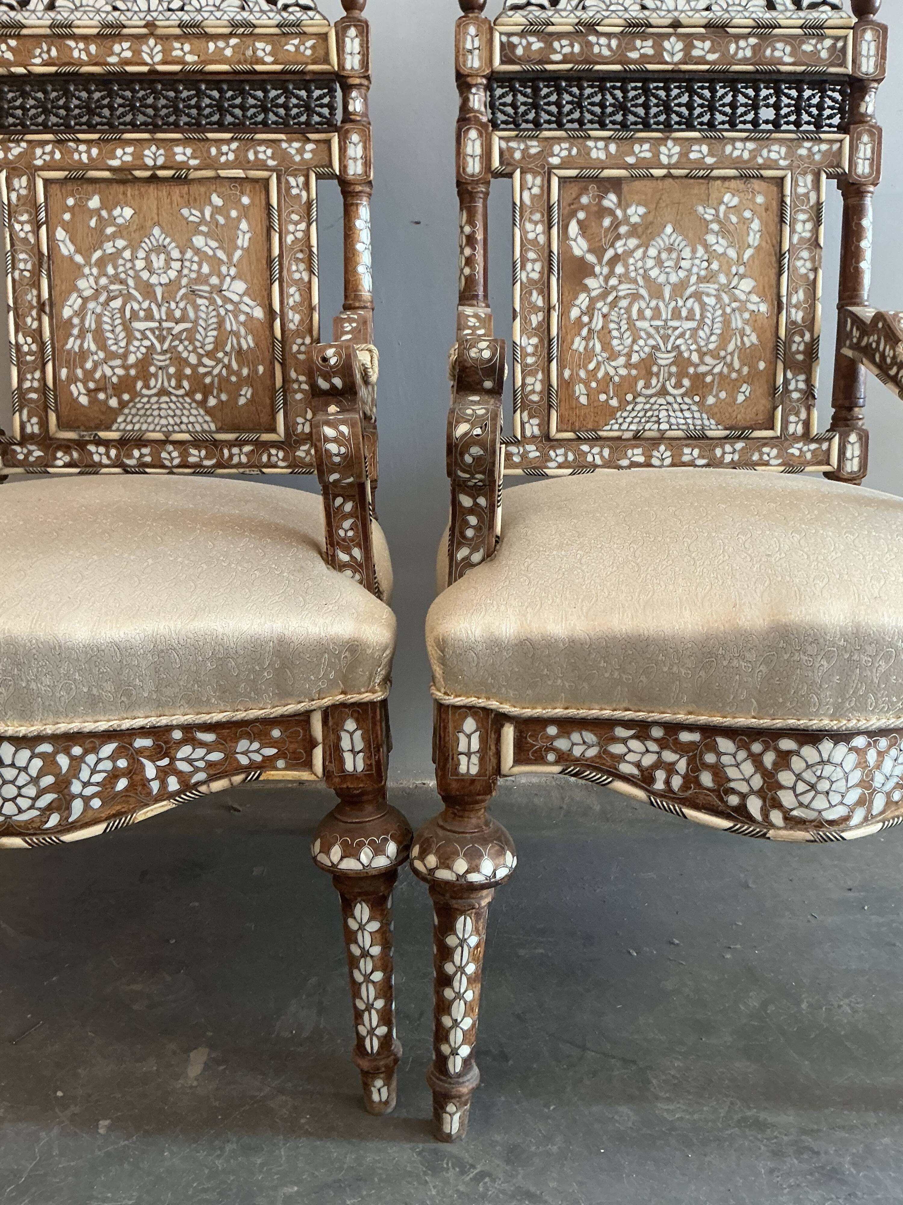 Syrian walnut armchairs inlaid with mother-of-pearl
