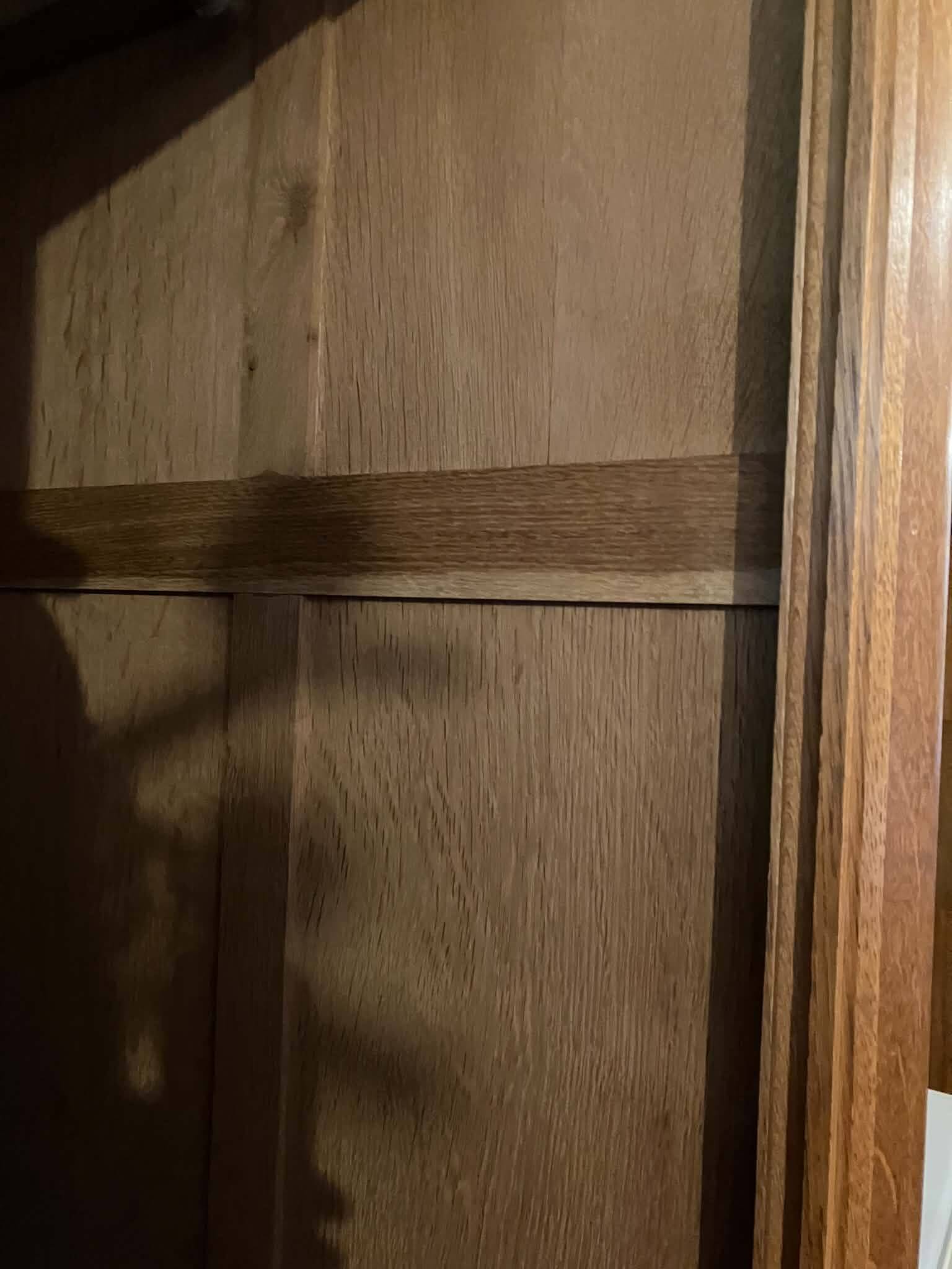 Vintage wooden wardrobe with sliding doors