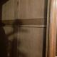 Vintage wooden wardrobe with sliding doors