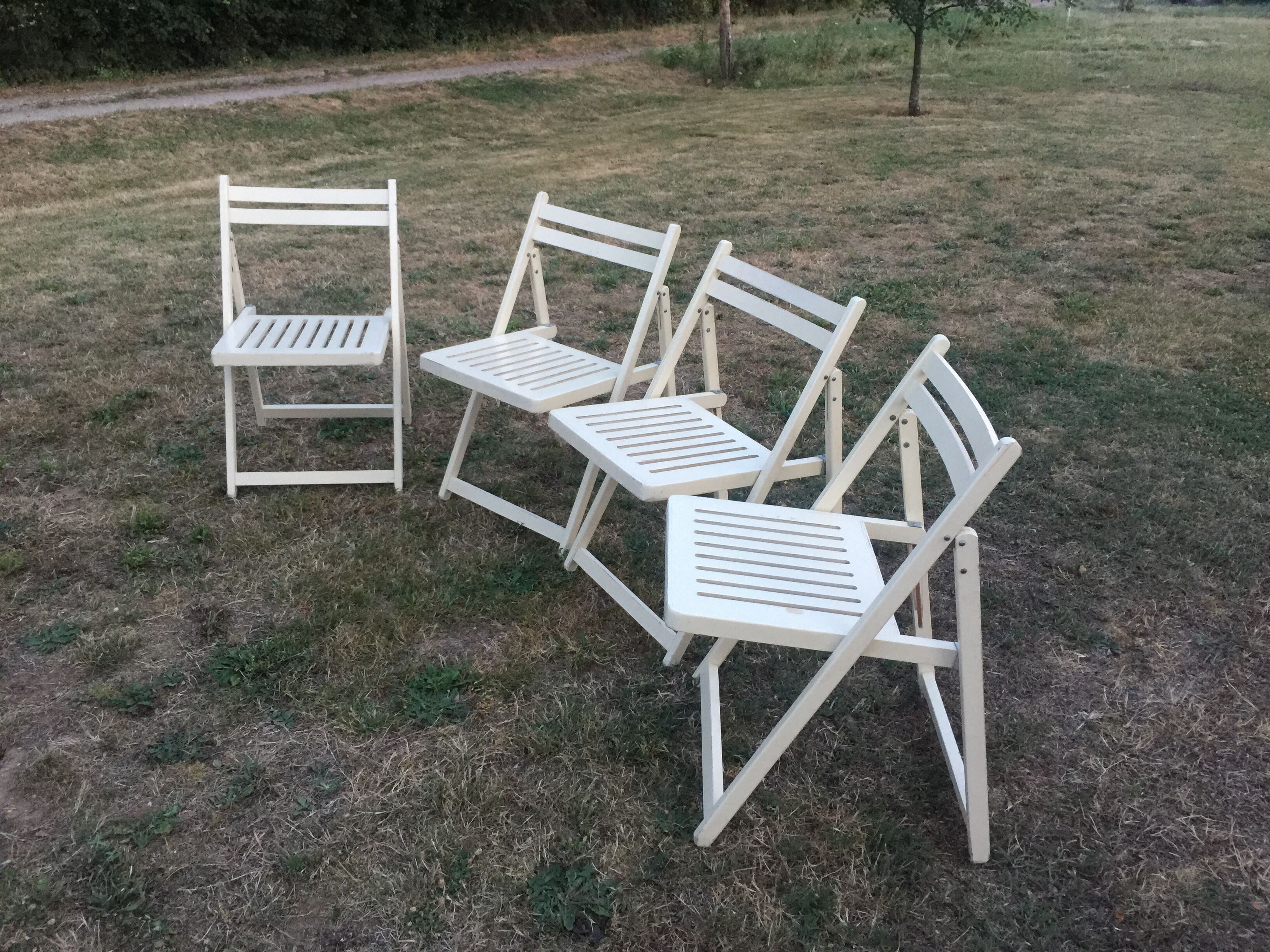 4 folding wooden chairs
