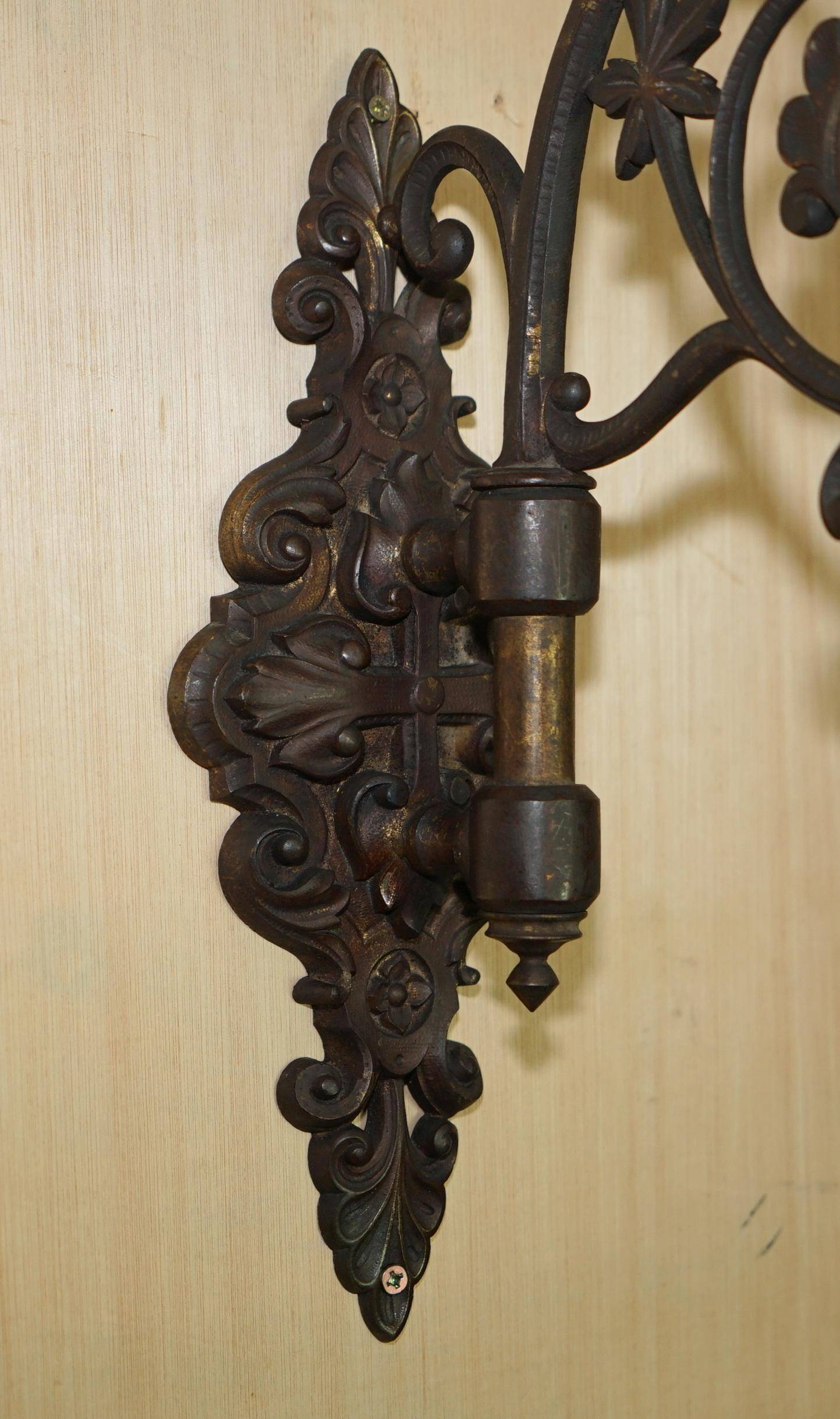 Pair of antique wall sconces in gilded bronze.