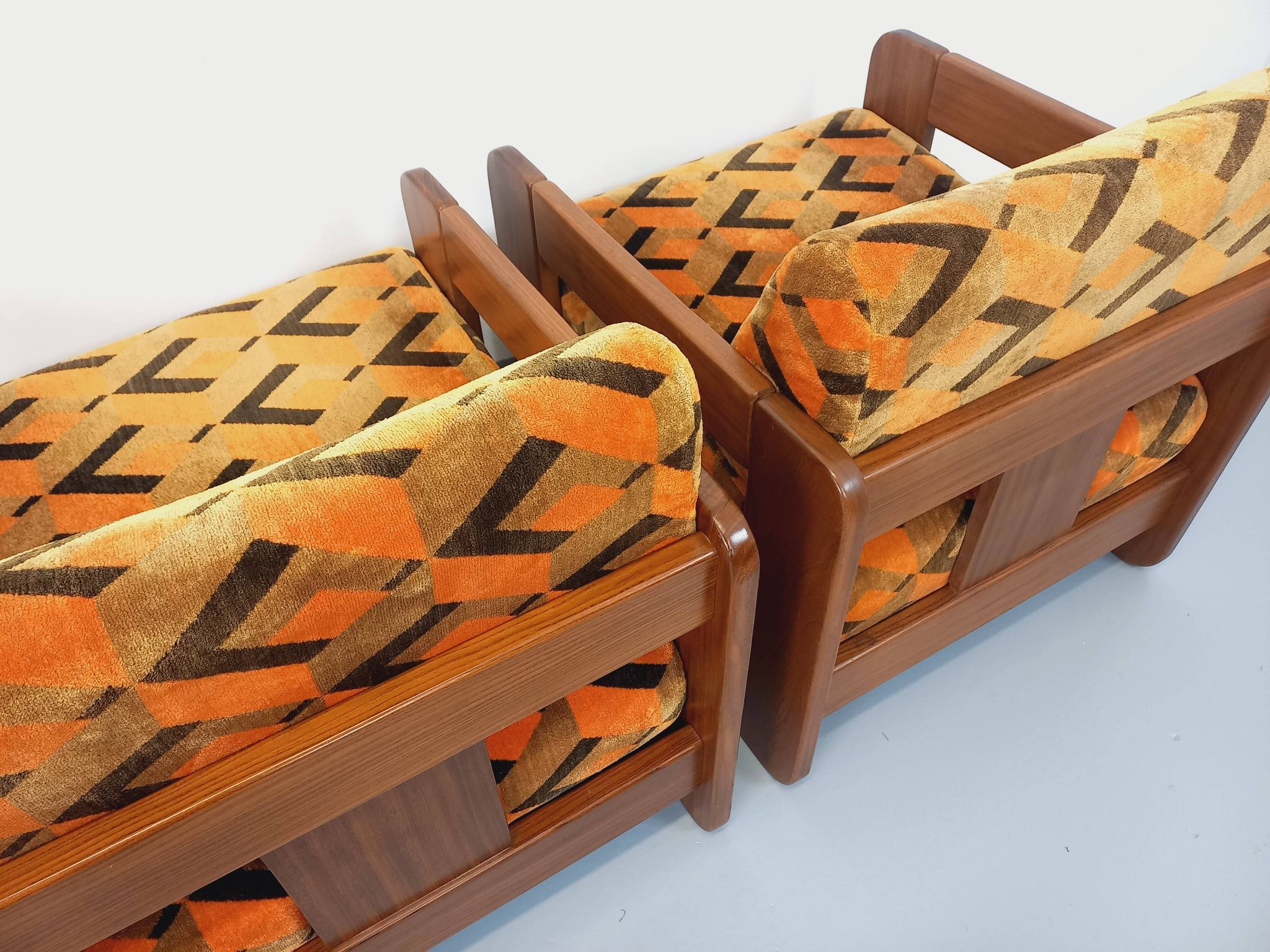 Pair of vintage walnut and velvet fabric sleigh armchairs from the 70s