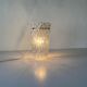 Simple arch-shaped wall light in textured glass, 1950s, Germany.
