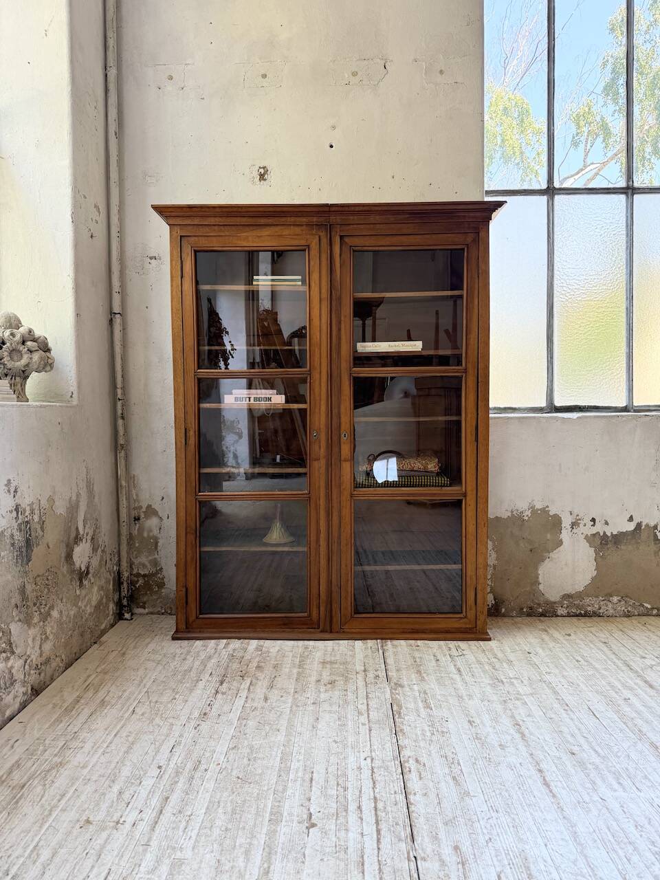 Glass-fronted walnut library 1900