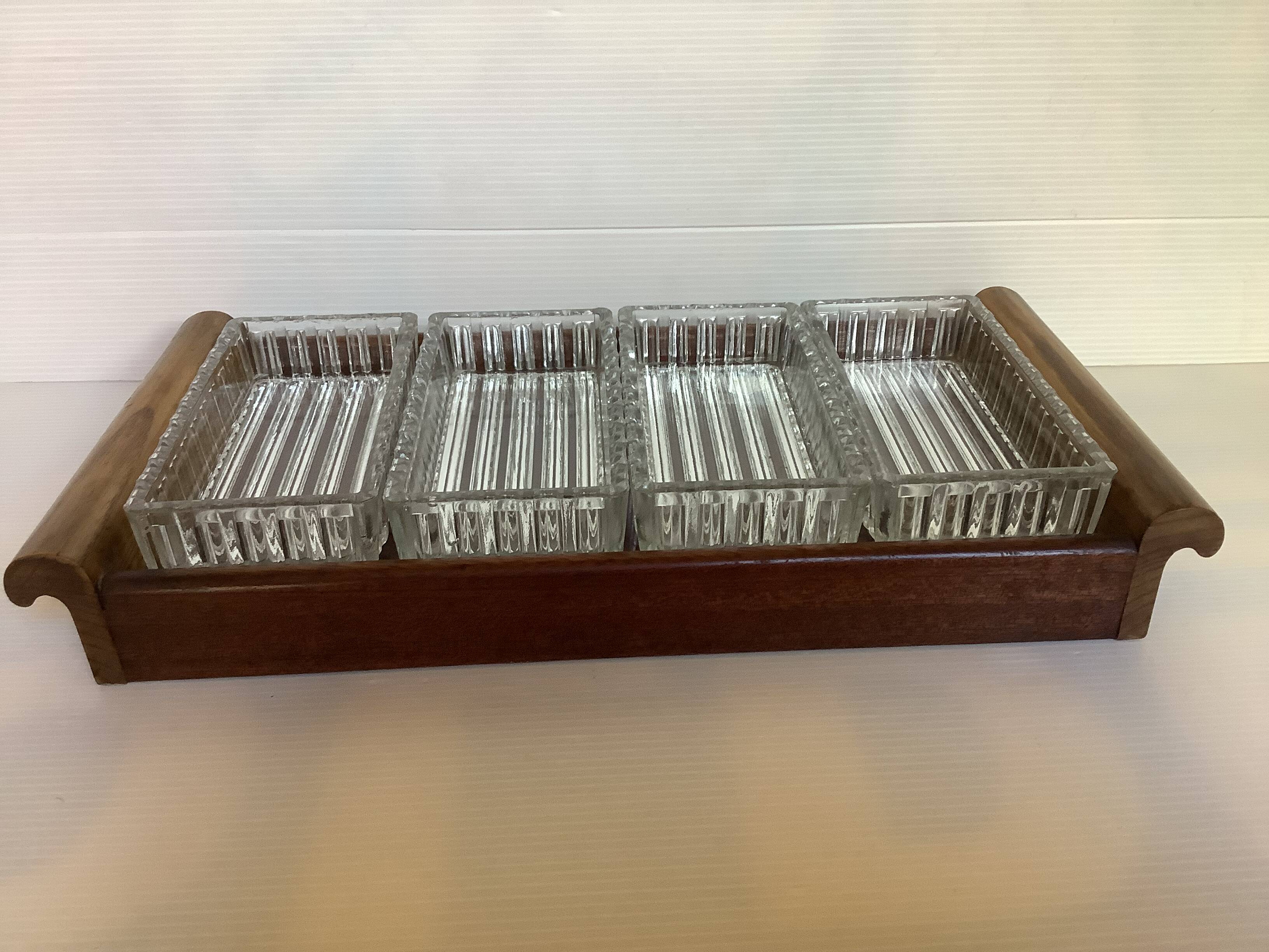 Old wooden serving tray and molded glass bowls