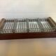 Old wooden serving tray and molded glass bowls