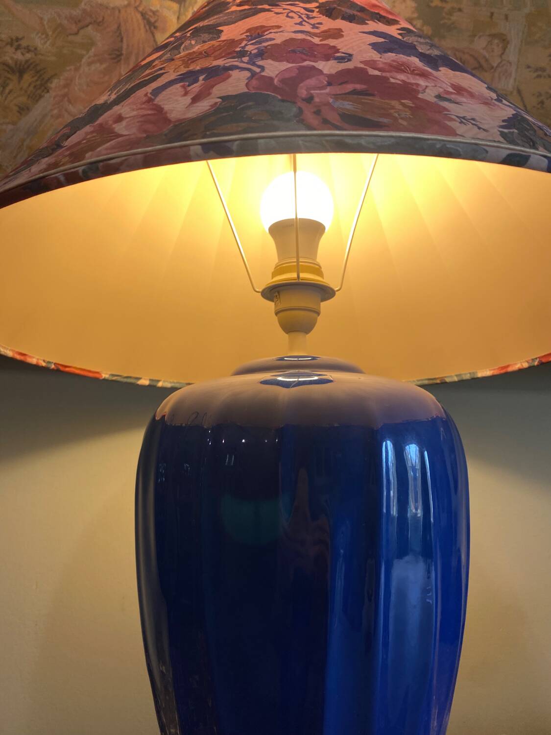 Large blue ceramic lamp with floral shade