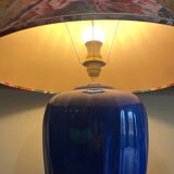 Large blue ceramic lamp with floral shade