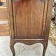 Carved and moulded solid wood commode in the Louis XV style.